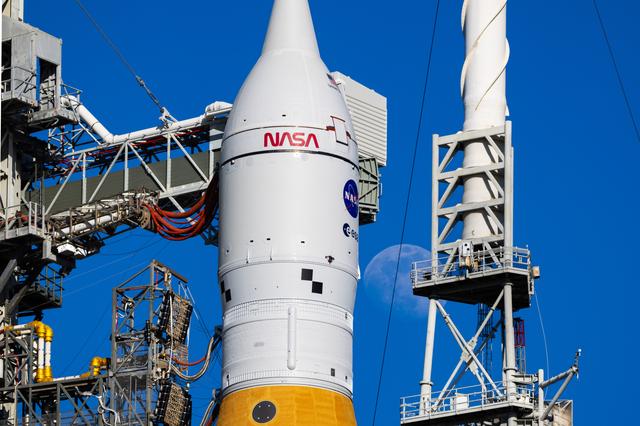 NASA image: Moon Seen Shining on Full Artemis II Stack at Launch Pad 39B